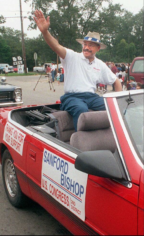 U.S. Rep. Sanford Bishop, D-Albany, waves to the crowd while riding in a convertible during the Southern Cotton Festival on Saturday, Sept. 21, 1996, in Meigs. Bishop was the master of ceremony. (Jeff Caplan/AP)