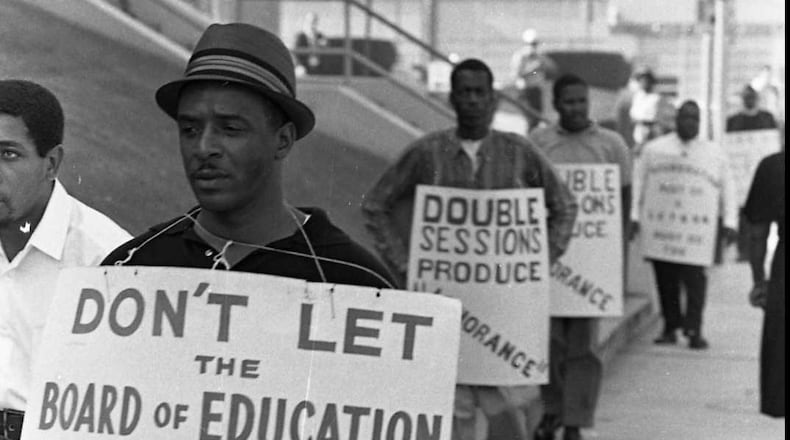 In 1967, African-American parents fought against segregated schools, picketing outside the Atlanta Public Schools offices. CHARLES R. PUGH, JR. / THE ATLANTA JOURNAL-CONSTITUTION