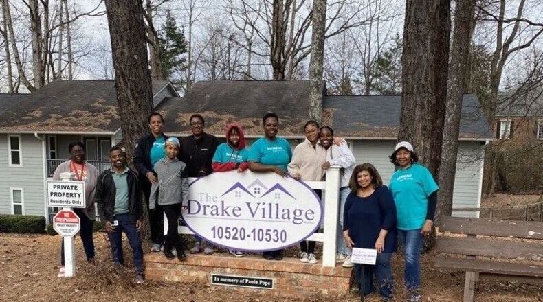 Volunteers with The Drake House recently completed a pathway on the Drake Village campus and inventoried furniture. COURTESY THE DRAKE HOUSE
