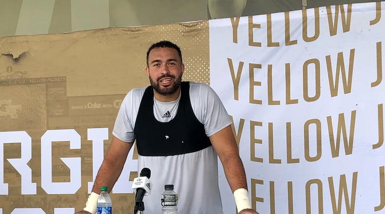 Georgia Tech offensive tackle Devin Cochran speaks to media Sept. 15, 2021 at Bobby Dodd Stadium following practice. (AJC photo by Ken Sugiura)