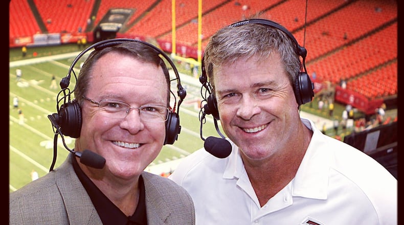 Wes Durham and Dave Archer in the Georgia Dome radio broadcast booth. (Courtesy Jimmy Cribb)