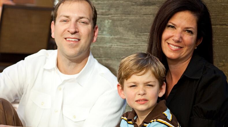 Mark and Layla Gunn, with son Lathan, make philanthropy a family affair through their charity, Pure Imagination. Photo: Courtesy of Layla Gunn