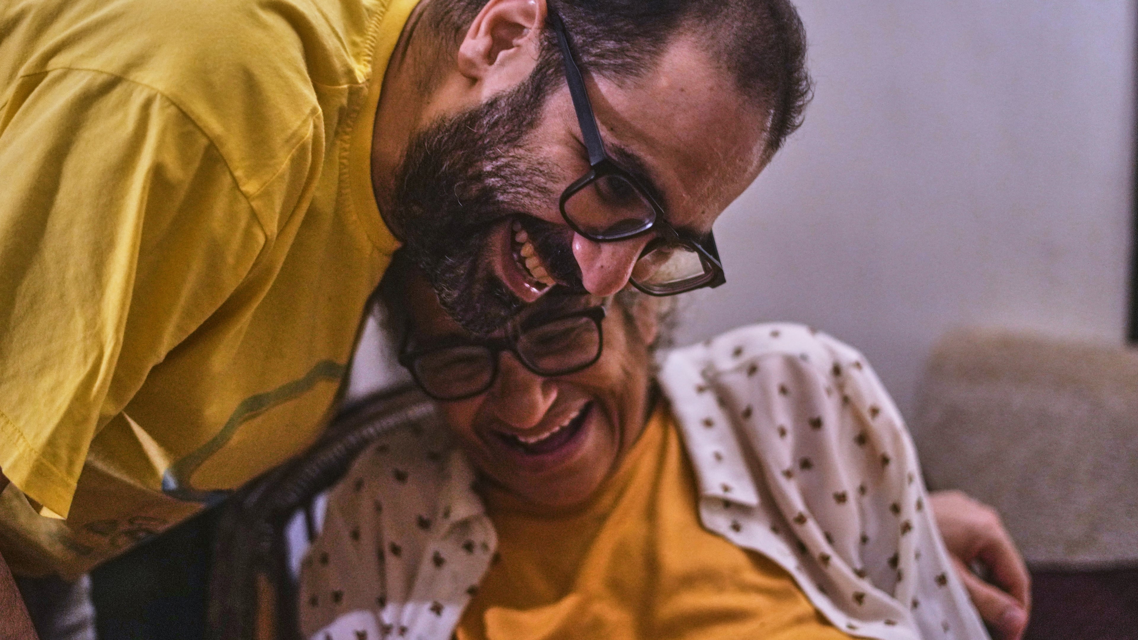 Activist Alaa Abd el-Fattah hugs his mother Laila Soueif, as he arrives at his home, after a presidential pardon, in Cairo, Egypt, Tuesday, Sept. 23, 2025. (AP Photo/Amr Nabil)