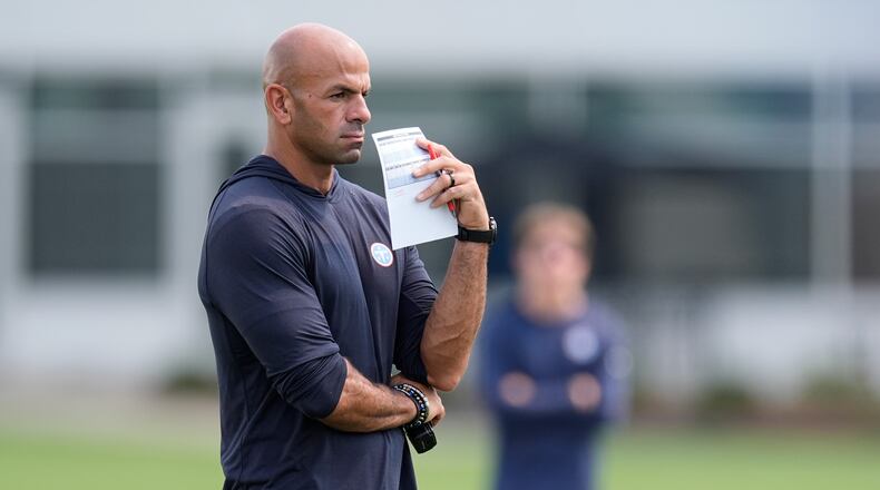 Tennessee Titans head coach Robert Saleh watch practice during the NFL football team's training camp Wednesday, July 29, 2026, in Nashville, Tenn. (AP Photo/George Walker IV)