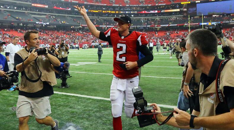 Falcons quarterback Matt Ryan celebrates a 37-34 overtime victory over the Saints in their NFL football game on Sunday, Sept. 7, 2014, in Atlanta.