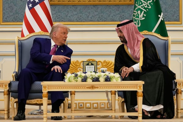President Donald Trump and Saudi Crown Prince Mohammed bin Salman speak during a meeting at the Royal Palace in Riyadh, Saudi Arabia, Tuesday, May 13, 2025. (AP Photo/Alex Brandon)