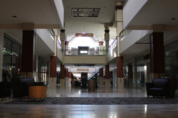 The inside of Town Center mall in Kennesaw was dark and empty after its power was shut off due to delinquent power bills, causing the mall to close Tuesday, Jan. 28, 2025. (Taylor Croft/AJC)