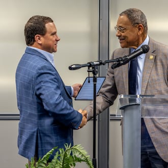 Georgia Agriculture Commissioner Tyler Harper (left) shakes hands with U.S. Rep. Sanford Bishop, D-Albany, during the annual Ham & Eggs Legislative Breakfast at Fort Valley State University on April 9, 2026. (Rebecca Evans/Fort Valley State University)