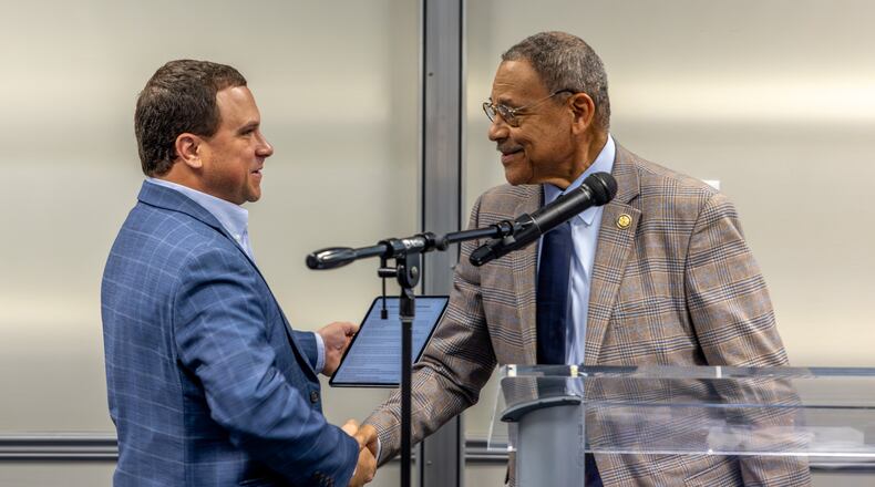 Georgia Agriculture Commissioner Tyler Harper (left) shakes hands with U.S. Rep. Sanford Bishop, D-Albany, during the annual Ham & Eggs Legislative Breakfast at Fort Valley State University on April 9, 2026. (Rebecca Evans/Fort Valley State University)