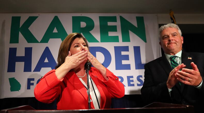 Karen Handel enjoys her big win. (Curtis Compton/ccompton@ajc.com)