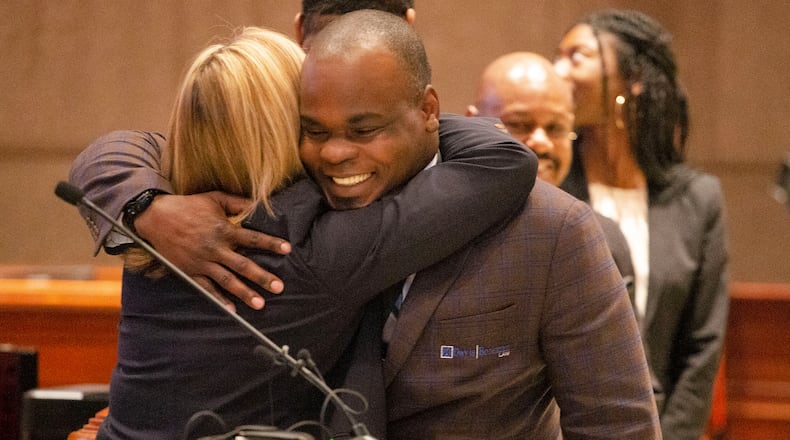 Basil Eleby hugs Judge Rebecca Crumrine Rieder after receiving his certificate during the Fulton County Behavioral Health Treatment Court Transition program graduation on Friday, February 28, 2020, at the Fulton County Government Center Assembly Hall in Atlanta. Eleby, the scapegoat accused of starting the fire that caused the I-85 bridge collapse, graduated from the 18-month mental health and sobriety program that he agreed to as part of a deal with prosecutors (Christina Matacotta, for The Atlanta Journal-Constitution).