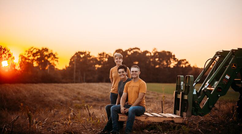 Paige Dockweiler, Amy Brown and Daniel Williams are partners in Doc Brown's Farm & Distillers. Courtesy of Amy Brown