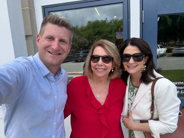 Greg Bluestein, Martha Zoller and Patricia Murphy pose for a picture at the WDUN studios on Friday, June 19, 2026. AJC/Greg Bluestein