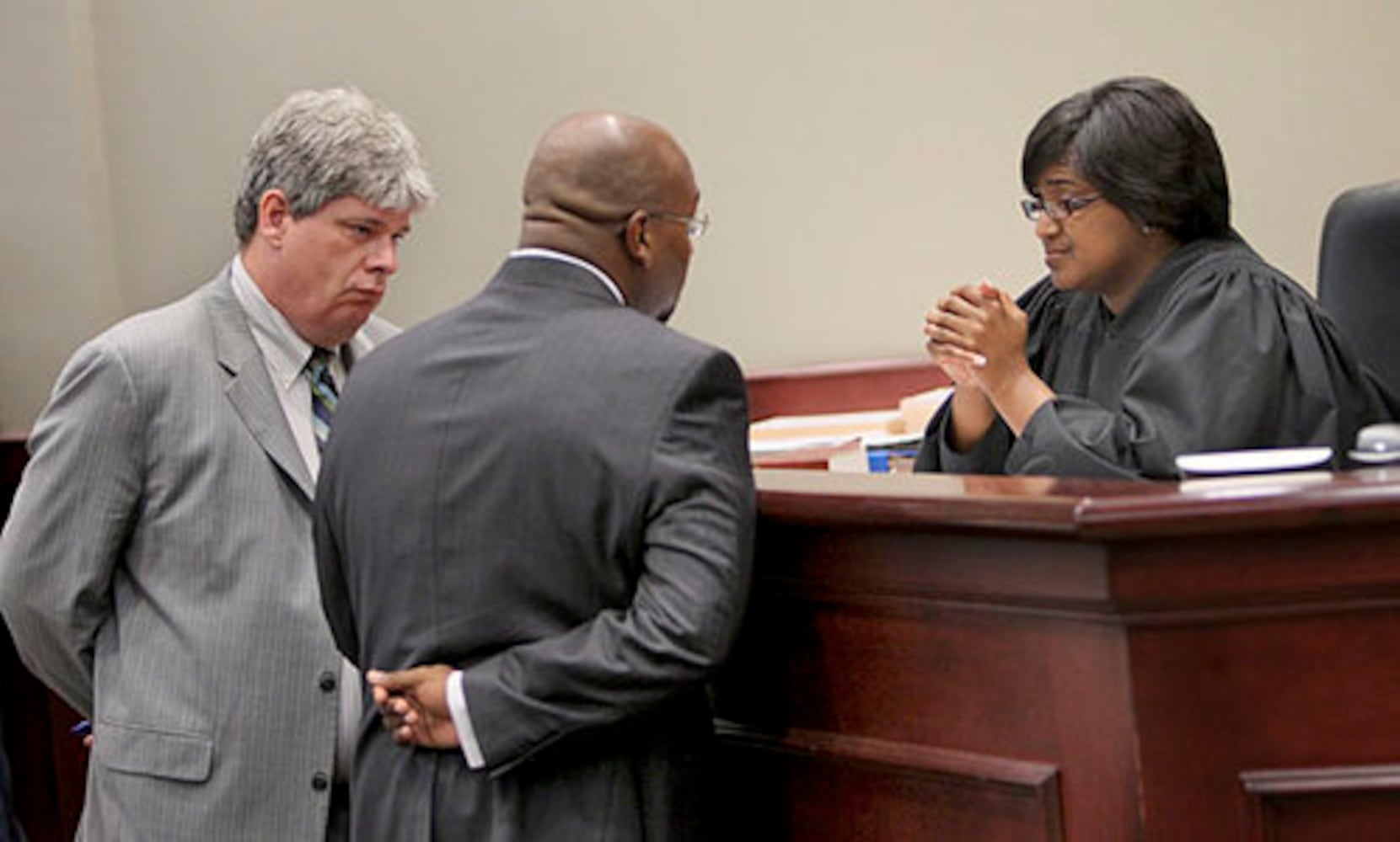 Teen in court, accused of killing cop