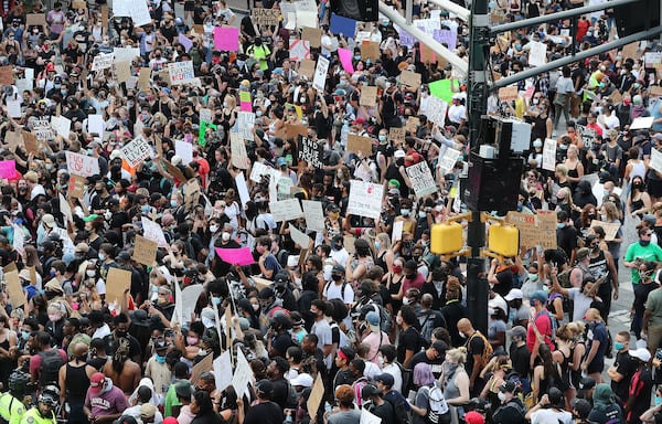 More than 1000 protesters fill Marietta Street at Centennial Olympic Park Drive outside the CNN Center at Olympic Park during a fifth day of protests over the death of George Floyd on Tuesday, June 2, 2020, in Atlanta. The state’s top public health official said she is concerned protest could be spreading the coronavirus and urged participants to be tested. CURTIS COMPTON / CCOMPTON@AJC.COM