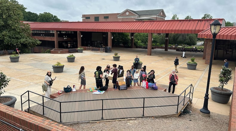 A small group protesting Israel's war in Gaza gathered in Tate Plaza on the campus of the University of Georgia in Athens around noon on Tuesday, April 30. Sixteen protesters were arrested on campus Monday.
