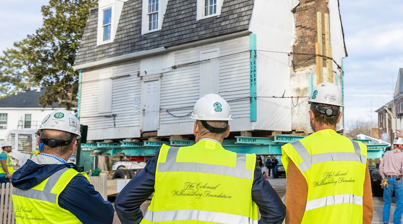 Director of Architectural Preservation Matthew Webster, Colonial Williamsburg Foundation President and CEO Cliff Fleet, Architectural Preservation Supervisor Steve Chabra stand in front of Bray School at William and Mary site.