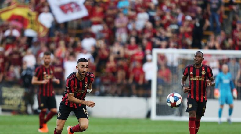 June 10, 2019 Kennesaw- Justin Meram, 14, midfielder for Atlanta United, dribbles the ball during the first half of a match between Atlanta United and Saint Louis FC at Kennesaw State University in Kennesaw, Georgia on Wednesday, July 10, 2019. Atlanta United and Saint Louis FC were tied 0-0 at the end of the first half. Christina Matacotta/Christina.Matacotta@ajc.com