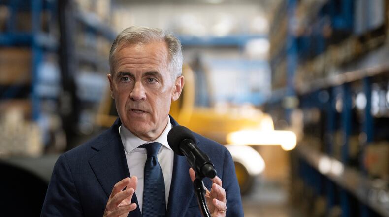 Canada's Prime Minister Mark Carney announces a proposed pipeline from Alberta to the B.C. coast in Calgary, Thursday, July 02, 2026. (Todd Korol/The Canadian Press via AP)