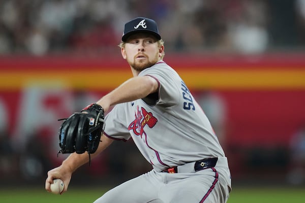 Atlanta Braves starting pitcher Spencer Schwellenbach throws against the Arizona Diamondbacks during the first inning of a baseball game Sunday, April 27, 2025, in Phoenix. (AP Photo/Ross D. Franklin)