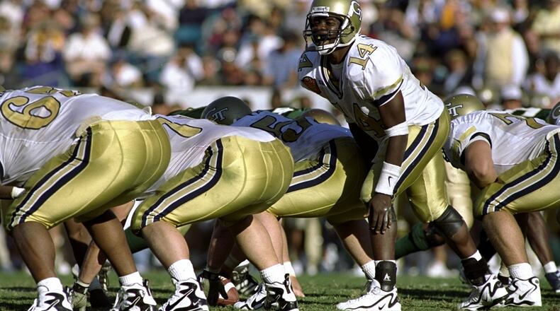 1 Jan 1999: Joe Hamilton #14 of the Georgia Tech Yellow Jackets calls from the line of scrimmage during the Toyota Gator Bowl against the Notre Dame Fighting Irish at Alltel Stadium in Jacksonville, Florida. Georgia Tech defeated Notre Dame 35-28. Mandatory Credit: Craig Jones /Allsport
