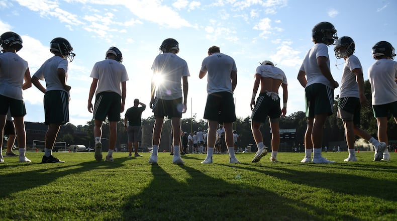 Players from The Westminster Schools warm up before their season opener in 2021. Lambert and Westminster led the state with 15 missed rules clinics each across all sports during the most recently completed academic year, 2023-24. (Hyosub Shin/AJC 2021).