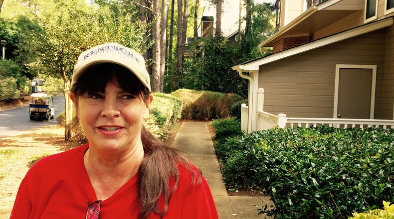Alicia Moore, 57, is a server at a local restaurant chain. She’s been un the same apartment for more than a decade, but the rent keeps rising. She works 60 hours a week and spends at least half her paycheck on that rent. (AJC staff photo)