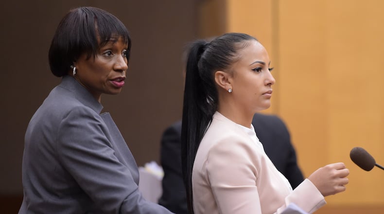 Delicia Cordon, right, and her lawyer, Tanya Mitchell Graham approach the podium during Cordon's eviction hearing in her case with LeSean McCoy, Buffalo Bills' running back, in Judge Melynee Leftridge's courtroom in Fulton County on Tuesday, August 14, 2018.
