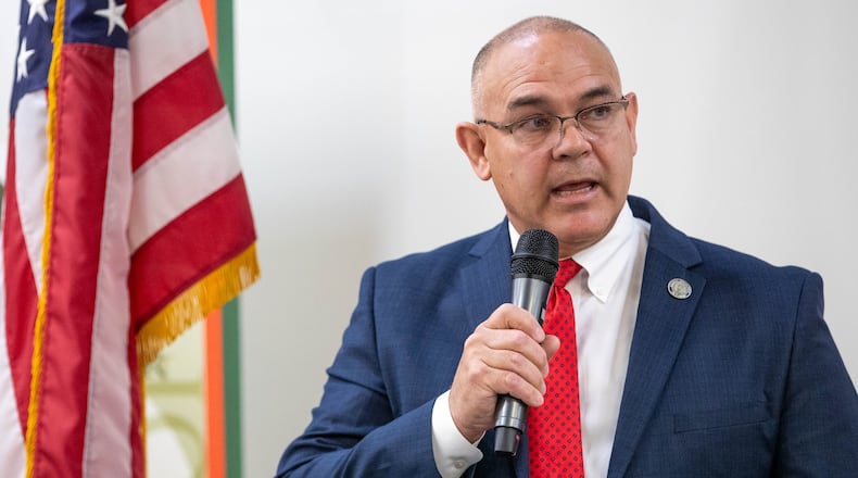 Georgia Department of Labor Commissioner Bruce Thompson speaks at an August press conference about the an investigation into the status of unremitted funds held by the department.  Thompson said Thursday that he has an advanced form of cancer.