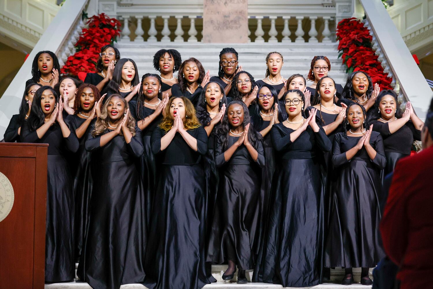 Members of the Spelman Glee Club perform at the Christmas Tree Lighting ceremony at the Georgia State Capitol on Monday, Dec. 8, 2025. (Miguel Martinez AJC)
