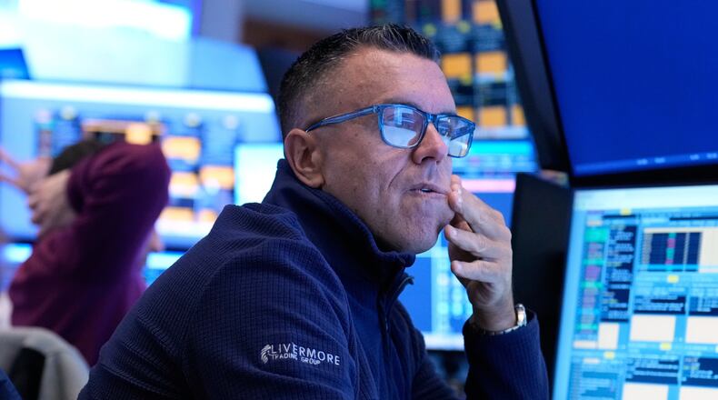 Traders work on the floor at the New York Stock Exchange in New York, Tuesday, March 10, 2026. (AP Photo/Seth Wenig)