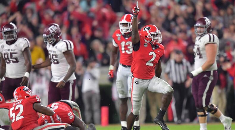 Georgia defensive back Richard LeCounte (2) celebrates a play against Texas A&M Saturday, Nov. 23, 2019, at Sanford Stadium in Athens.
