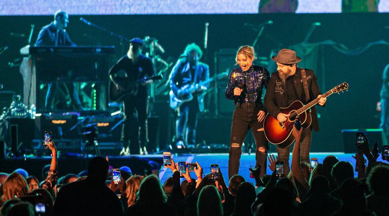 Sugarland's Jennifer Nettles and Kristian Bush play to the crowd at Mercedes-Benz Stadium fior ATLive on Nov. 15, 2019. Photo: Ryan Fleisher/Special to the AJC.