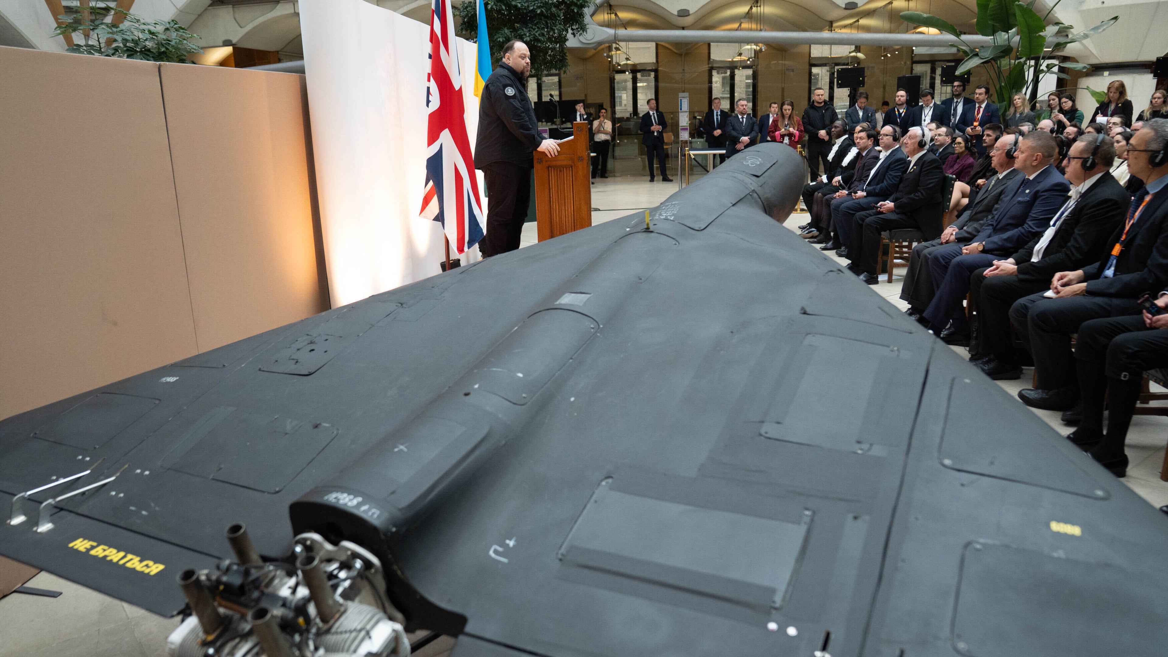 Ruslan Stefanchuk, Chairman of the Verkhovna Rada of Ukraine, addresses MPs and Peers in the Houses of Parliament, as an Iranian-made drone of Russian's army that was shot down and captured by the Ukrainian military goes on display at the Palace of Westminster, London, Wednesday Oct. 15, 2025. (Stefan Rousseau/PA via AP)