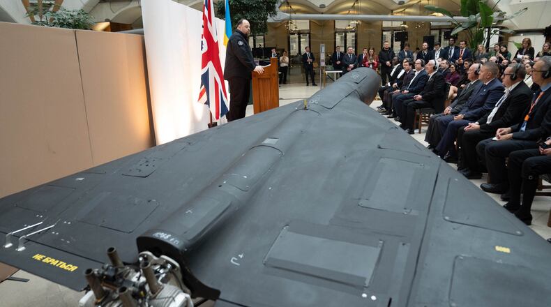 Ruslan Stefanchuk, Chairman of the Verkhovna Rada of Ukraine, addresses MPs and Peers in the Houses of Parliament, as an Iranian-made drone of Russian's army that was shot down and captured by the Ukrainian military goes on display at the Palace of Westminster, London, Wednesday Oct. 15, 2025. (Stefan Rousseau/PA via AP)
