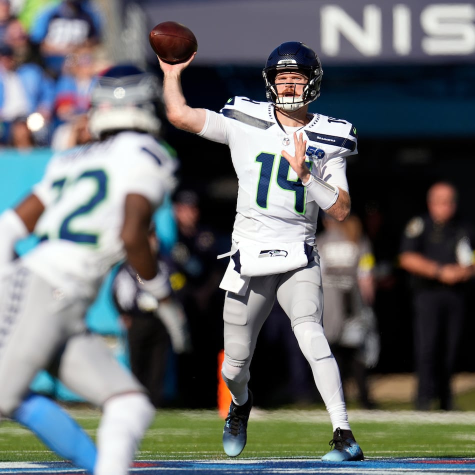 Seattle Seahawks quarterback Sam Darnold, who was with Minnesota last season, signed a three-year, $100.5 million contract with the Seahawks in free agency. (George Walker IV/AP)