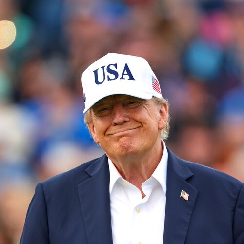 U.S. President Donald Trump smiles after the trophy presentation of the Irish Open at the Trump International Golf Links course in Doonbeg, Ireland, Sunday, Sept. 13, 2026.(AP Photo/Peter Morrison)