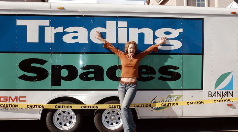 Paige Davis, host of "Trading Spaces," poses on set in 2003. Davis and original design experts are returning to TLC's revamp of the show.