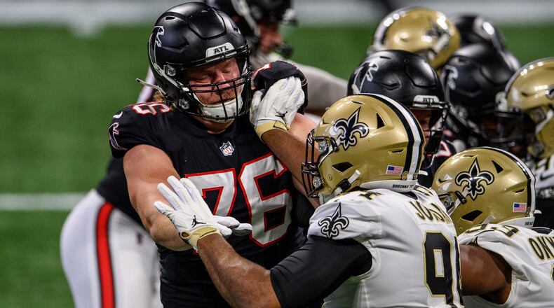 Atlanta Falcons offensive tackle Kaleb McGary (76) works against New Orleans Saints defensive end Cameron Jordan (94) during the first half Sunday, Dec. 6, 2020, at Mercedes-Benz Stadium in Atlanta. The Saints won 21-16. (Danny Karnik/AP)