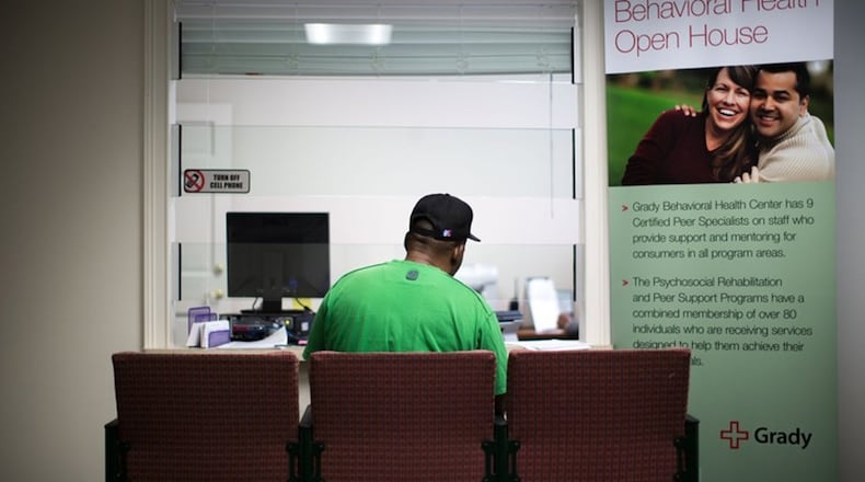 A patient waits at an outpatient mental health clinic in Atlanta. Thirty-five people under the care of community-based mental health agencies killed themselves between July 2016 and June 2017. BRANDEN CAMP / AJC files