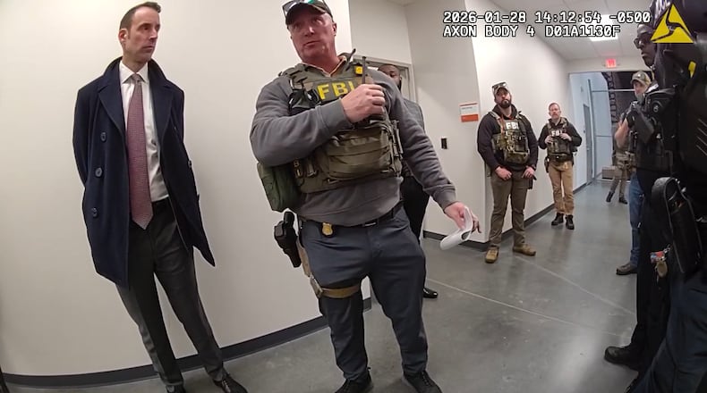Bodycam footage obtained by the AJC shows Fulton County Police Department officers and FBI agents during the execution of a search warrant at Fulton County’s election office.