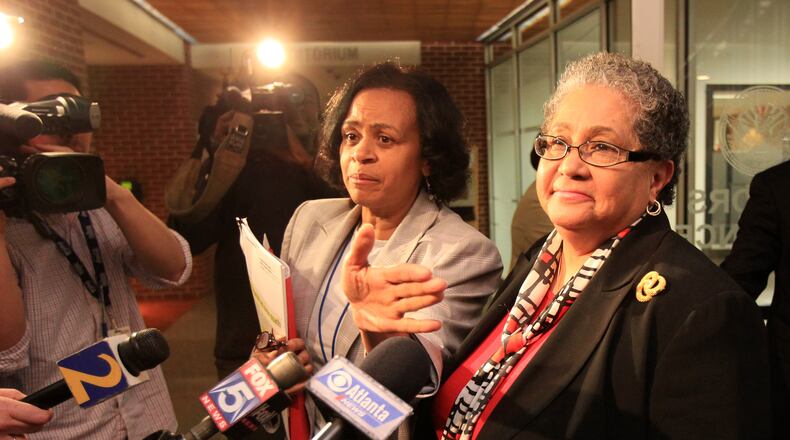 Beverly Hall, then the Atlanta schools superintendent, faces reporters after a 2011 school board meeting that focused on test-cheating allegations. CURTIS COMPTON / CCOMPTON@AJC.COM