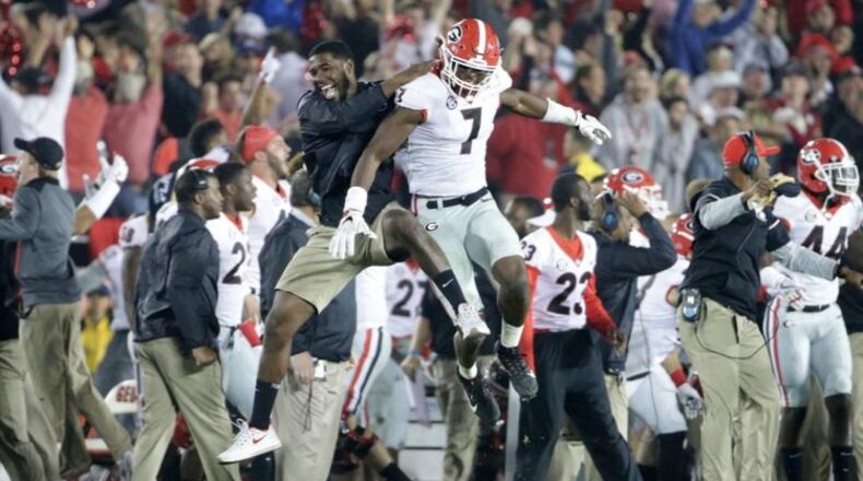 Georgia's Lorenzo Carter (7) celebrated after blocking Oklahoma's field goal attempt in the second overtime