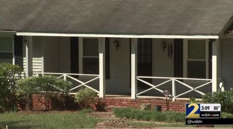 A man’s body was found in the basement of a home in the 2300 block of Phillips Road in DeKalb County. (Credit: Channel 2 Action News)