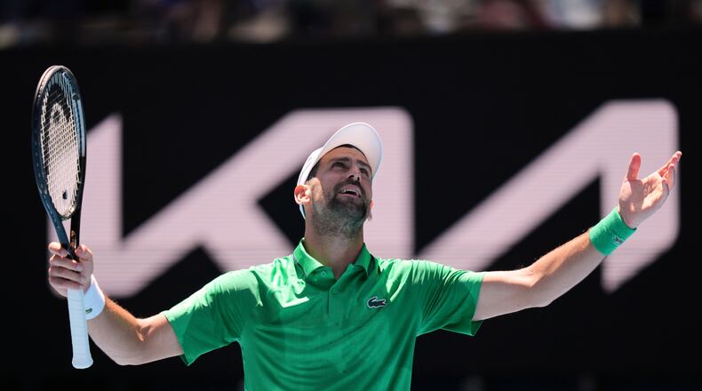 Novak Djokovic of Serbia reacts during his second round match against Francesco Maestrelli of Italy at the Australian Open tennis championship in Melbourne, Australia, Thursday, Jan. 22, 2026. (AP Photo/Aaron Favila)