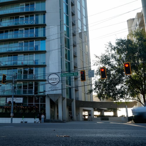The shooting happened inside the parking deck of Mezzo apartment homes, police say. (Ben Hendren for the AJC)