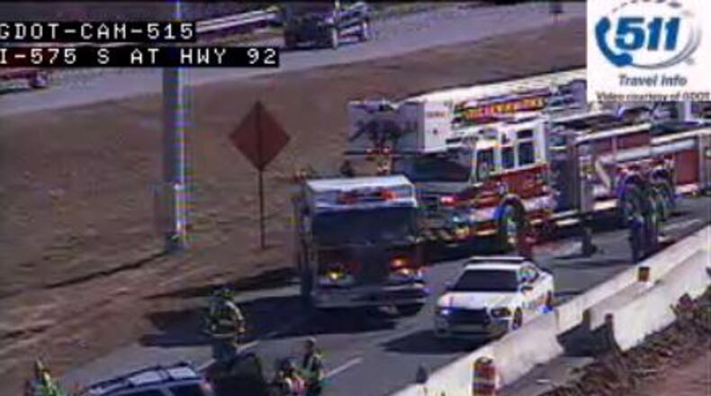 An overturned car has blocked all I-575 northbound lanes in Cobb County, according to Channel 2 Action News.