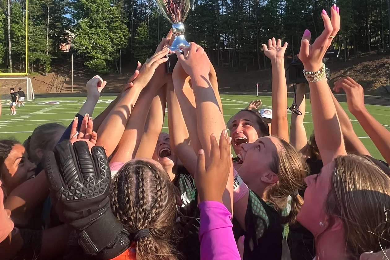 The Greenbrier Wolfpack celebrate their Class AAAAA girls’ soccer championship on Wednesday at Duluth High School, after beating Chamblee 3-0. (Jeff Gable/Access Atlanta)