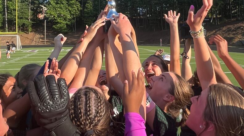 The Greenbrier Wolfpack celebrate their Class AAAAA girls’ soccer championship on Wednesday at Duluth High School, after beating Chamblee 3-0. (Jeff Gable/Access Atlanta)