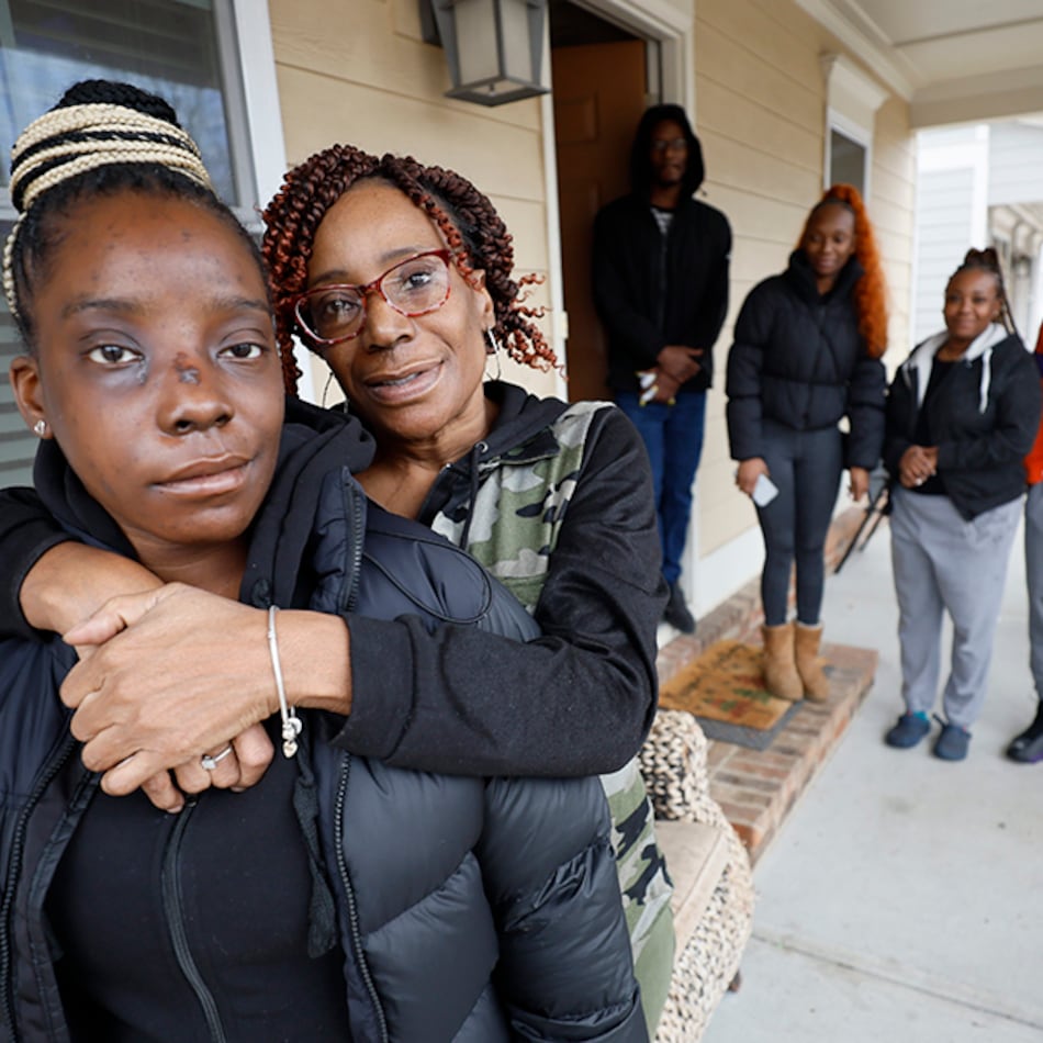 Tonya McElrathbey embraces her daughter Brianna McElrathbey outside her house during a family reunion as the other siblings pose in the background. Tonya’s family has always been together, but their bond grows stronger after Brianna’s incident when she was shot on January 2, 2024.
Miguel Martinez /miguel.martinezjimenez@ajc.com